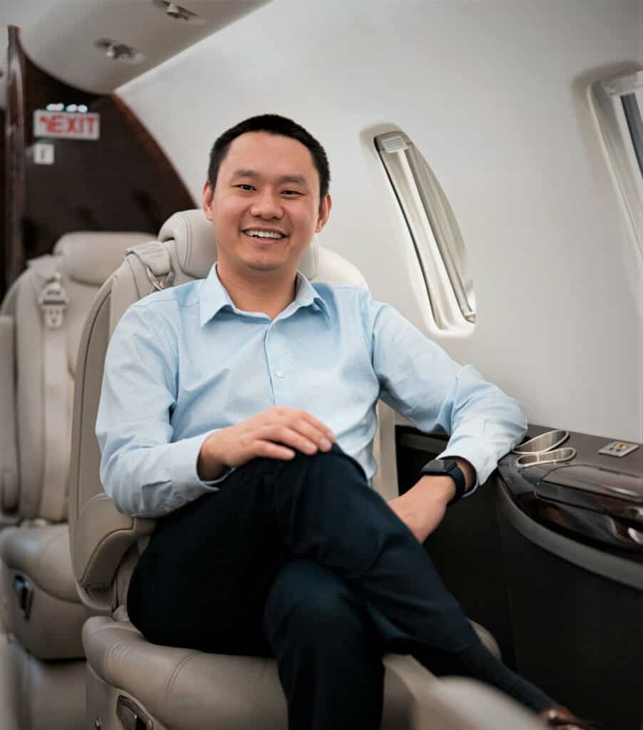man smiling in aircraft